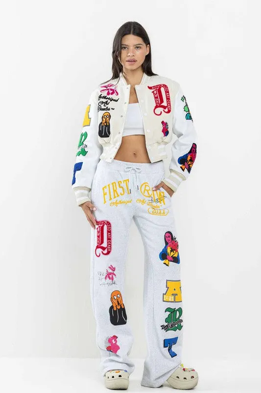 Cream Art Dealer Graphic Cropped Varsity Jacket