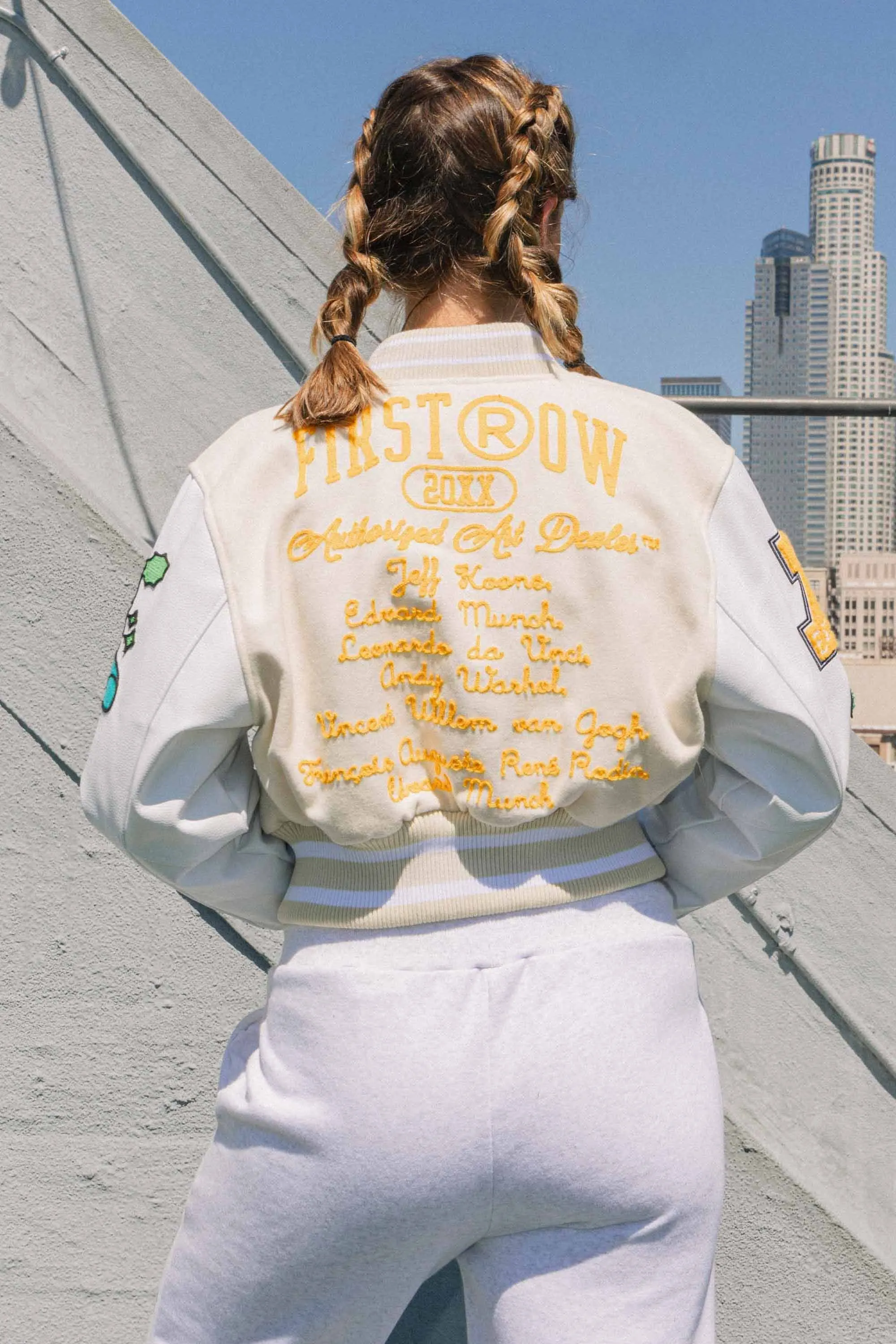 Cream Art Dealer Graphic Cropped Varsity Jacket