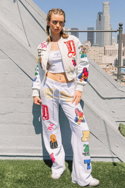 Cream Art Dealer Graphic Cropped Varsity Jacket